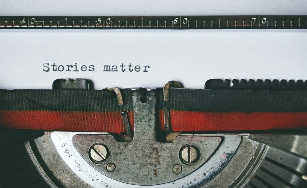 Vintage typewriter with the words 'Stories matter' typed on paper